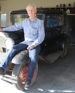 Wheels setting on the fender of Model A