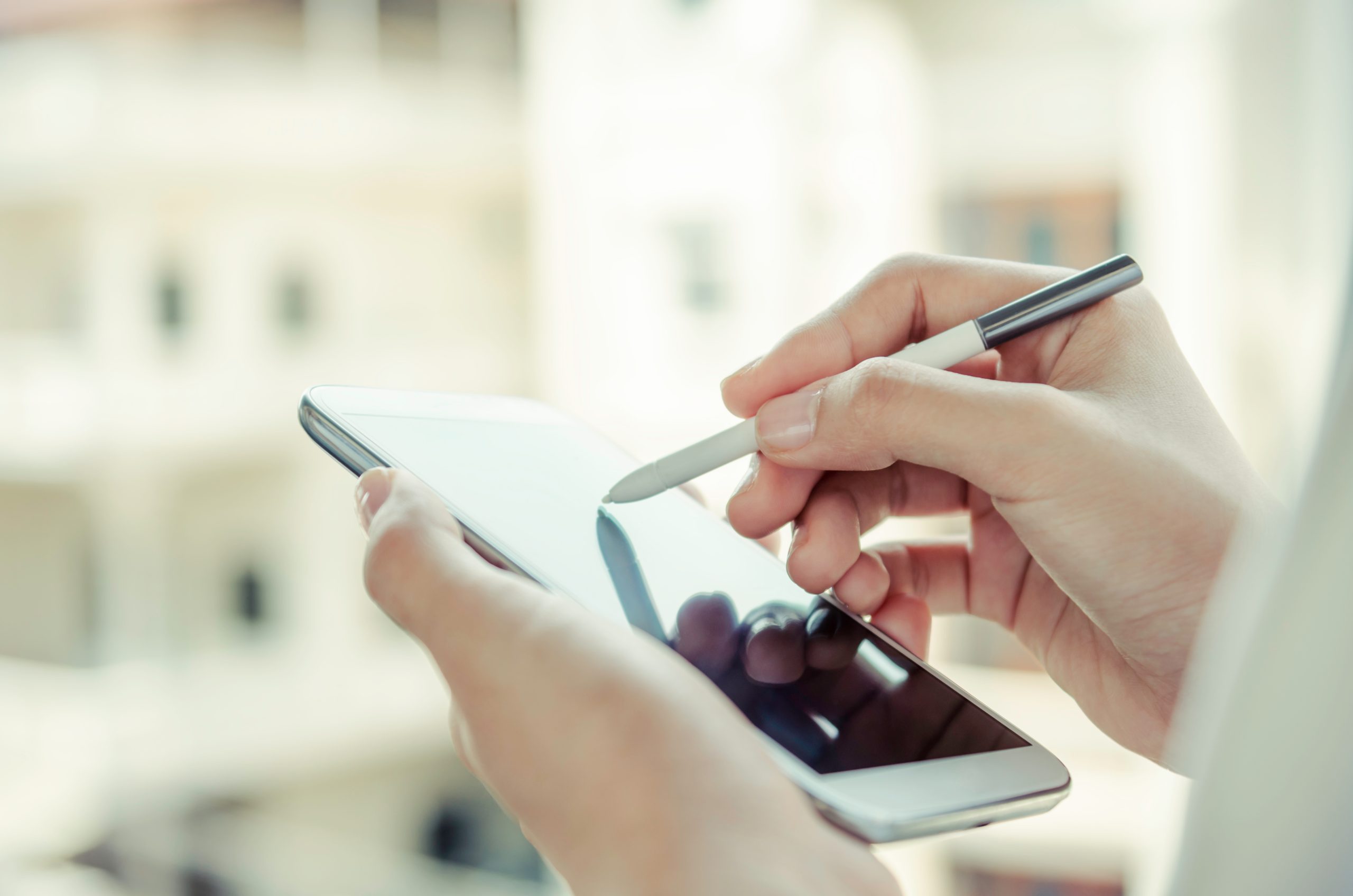 Person taking notes on cellphone